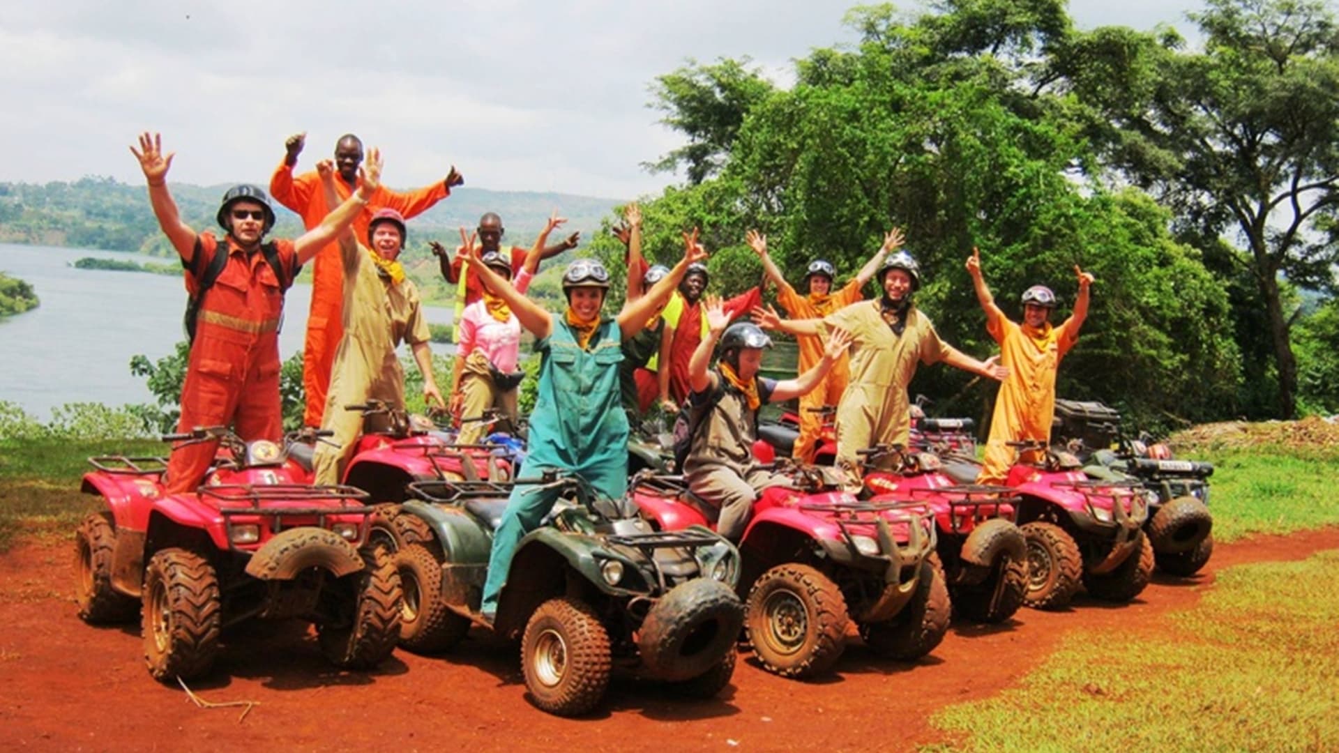 A group on quad bikes cheering above the Nile